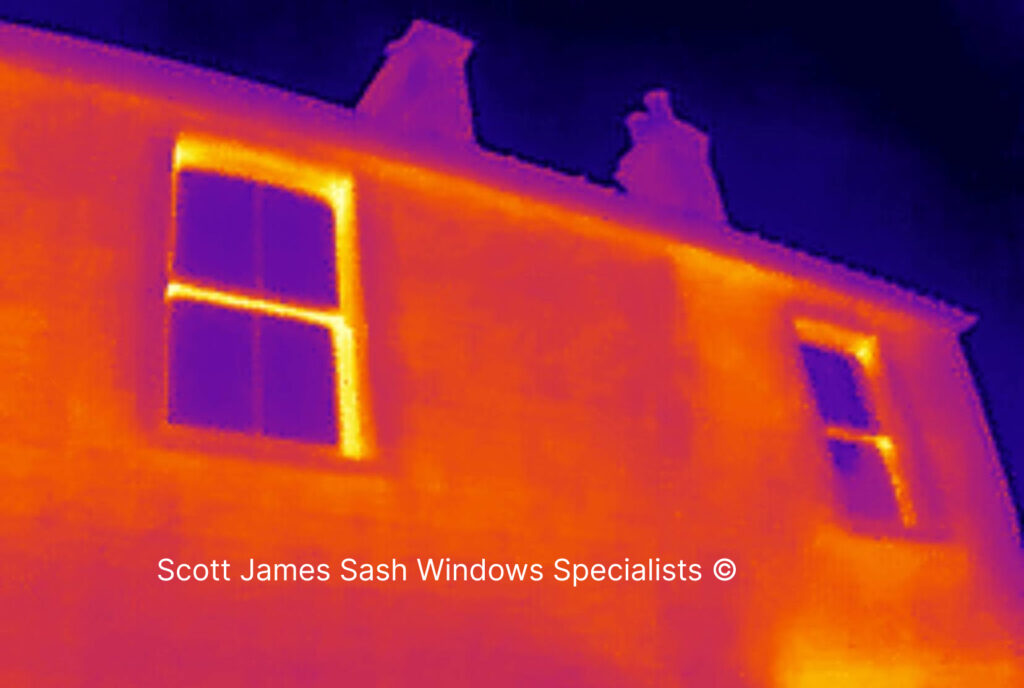Thermal image of a house showing heat distribution double glazed sash windows retrofited