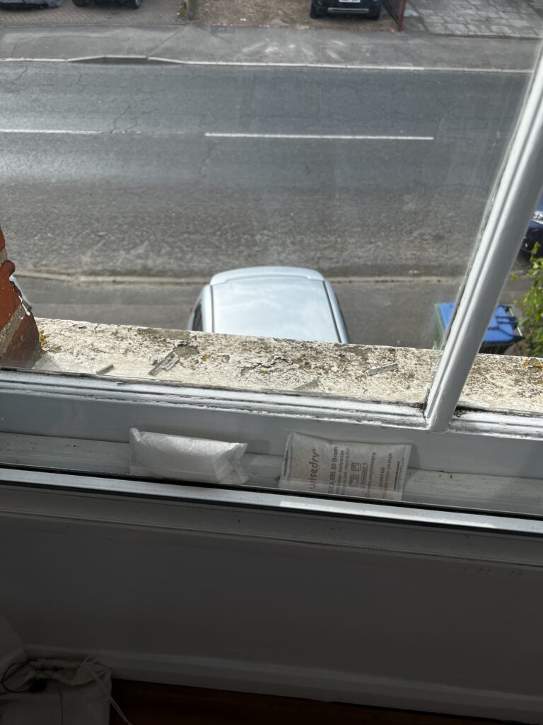 How to stop condensation build-up between secondary glazing and windows